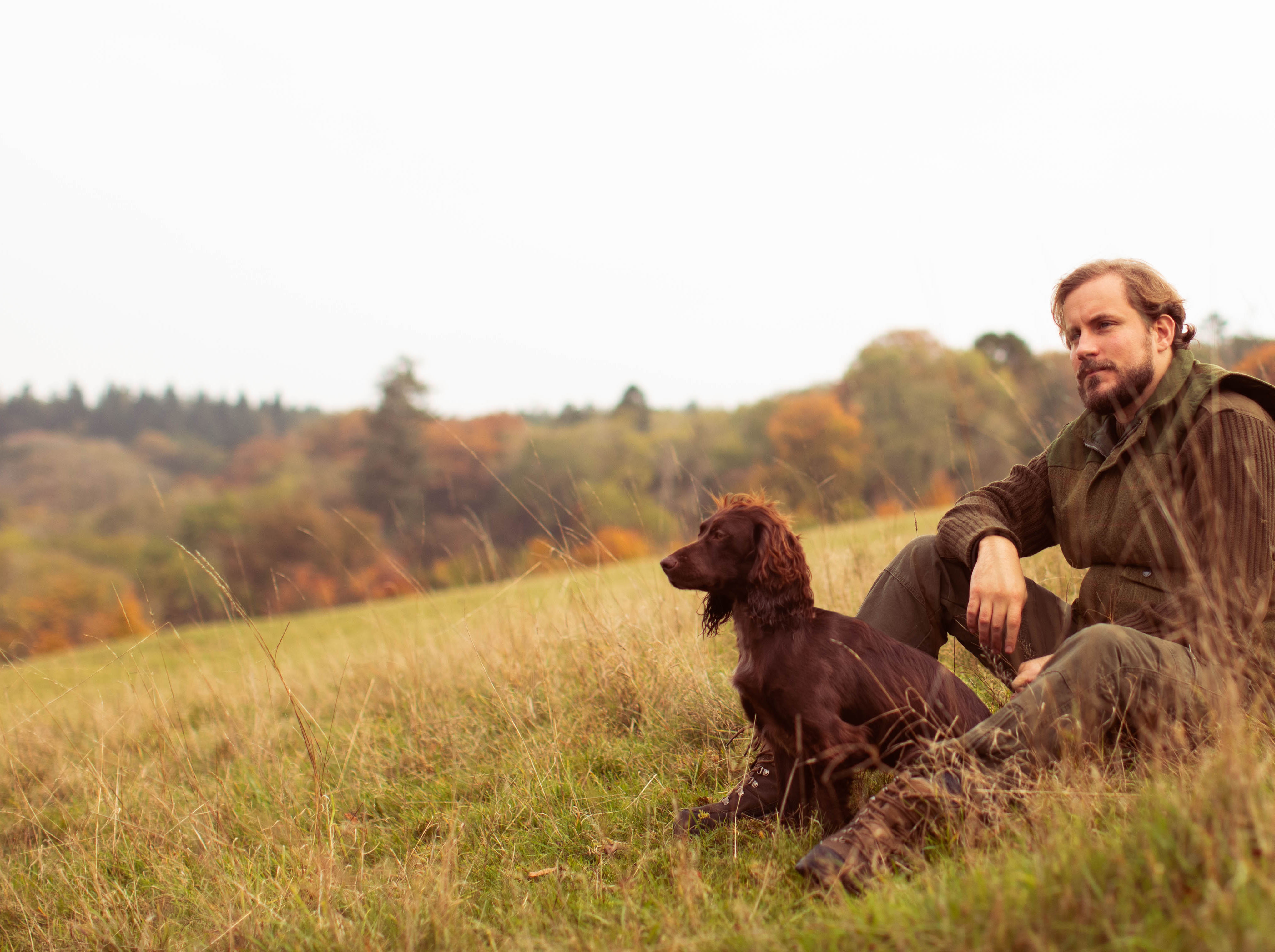 Man sitting with his dog